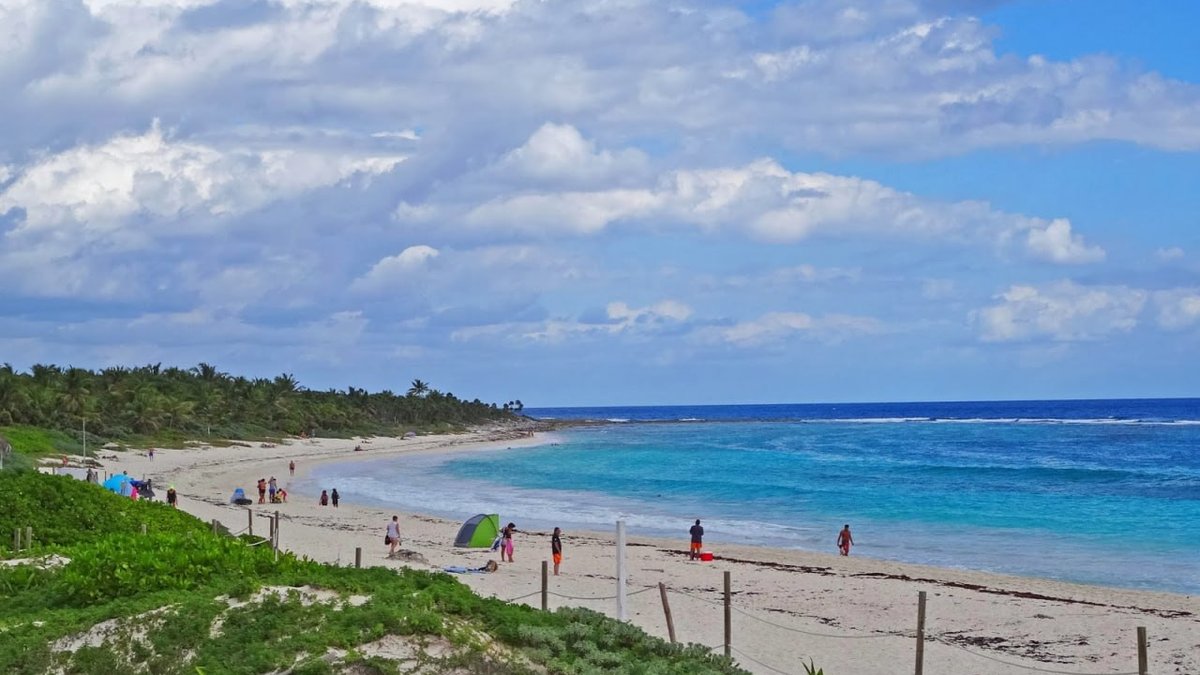 Xcacel protected beach near Tulum with natural dunes and Caribbean water