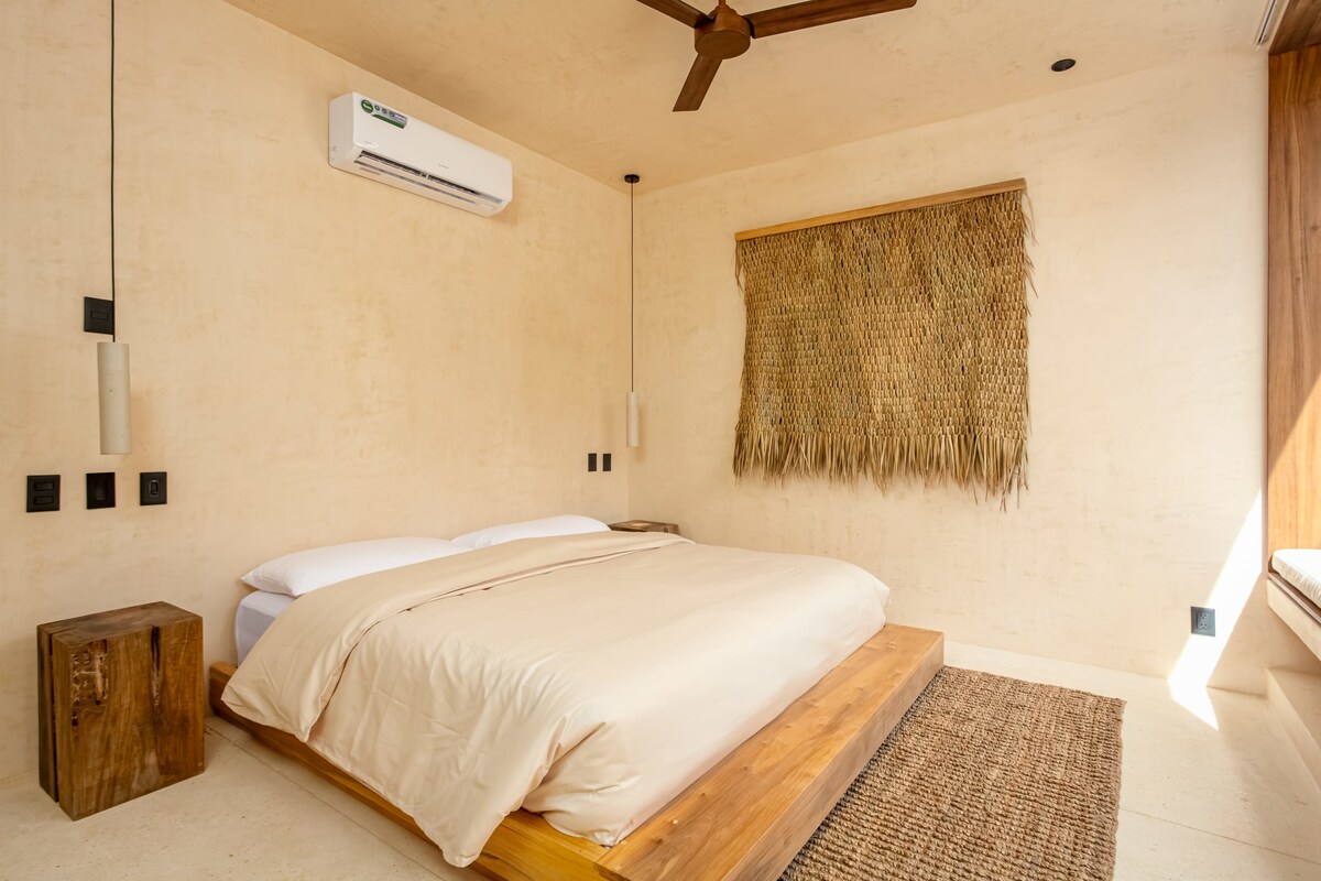 Villa hallway with natural materials and artisan decor at Luxury Jungle VIBE Tulum