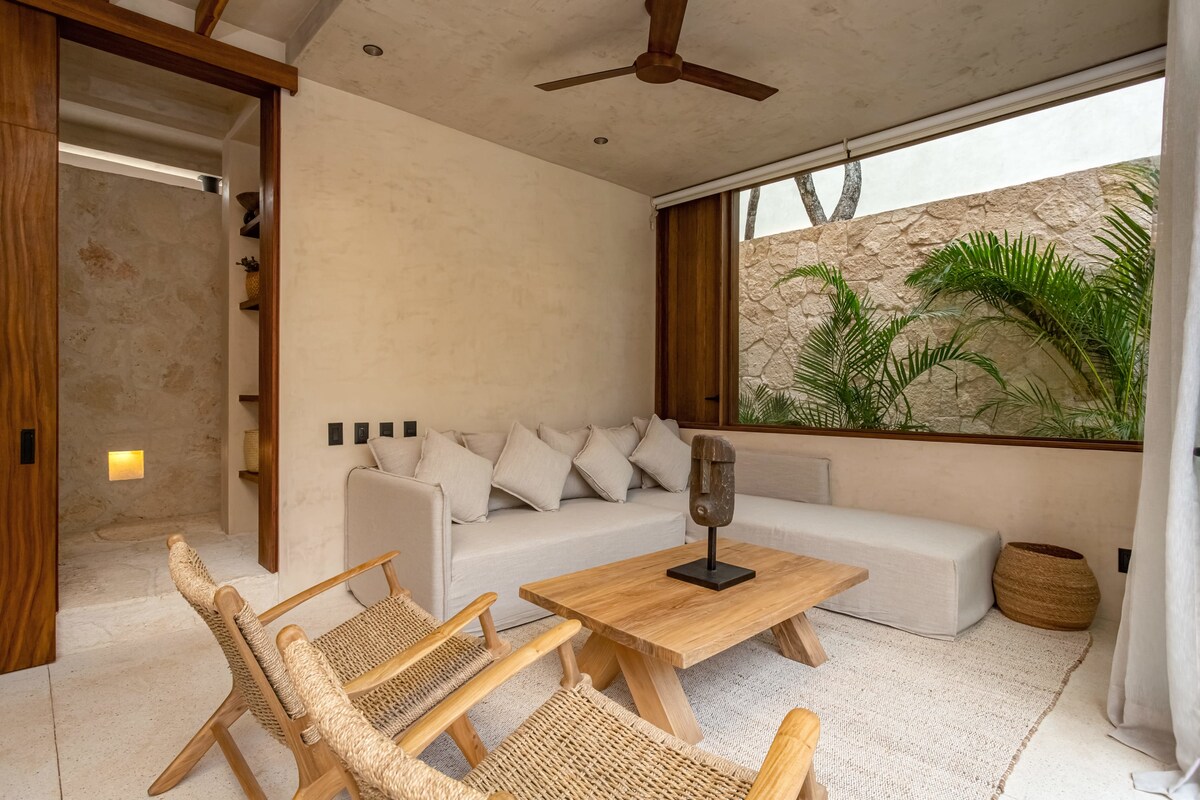 Private terrace with hammock and lush jungle backdrop at Luxury Jungle VIBE Tulum