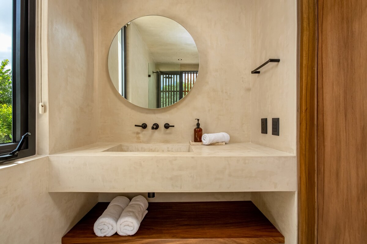 Staircase with contemporary architectural details at Luxury Jungle VIBE Tulum villa