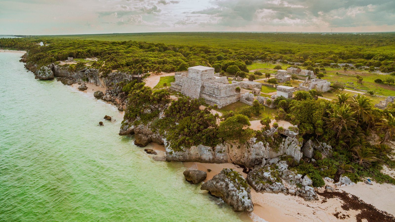 Aerial view of the walled Mayan city of Tulum on the coast