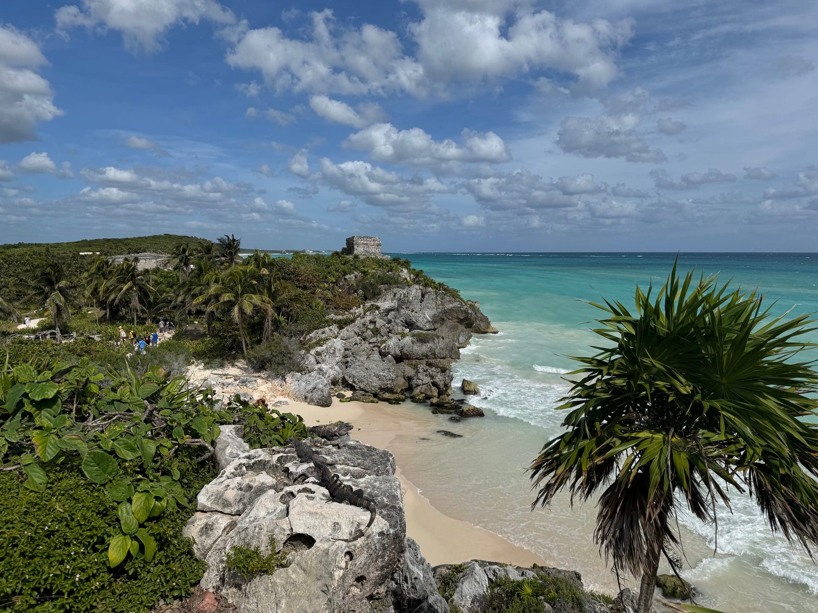 Tulum ruins on a cliff above turquoise Caribbean water