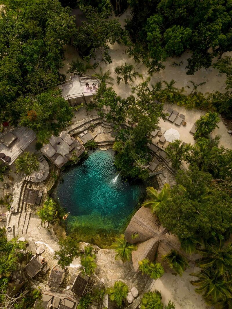Vesica Tulum lounge area with daybeds in the jungle